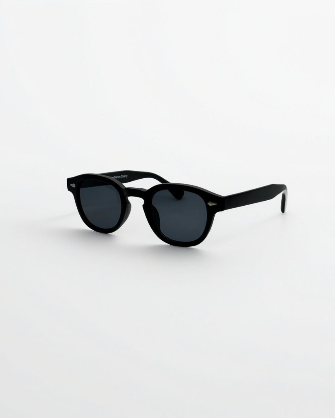 Close-up product view of harbor black black sunglasses by Alga, showing the frame and lenses.