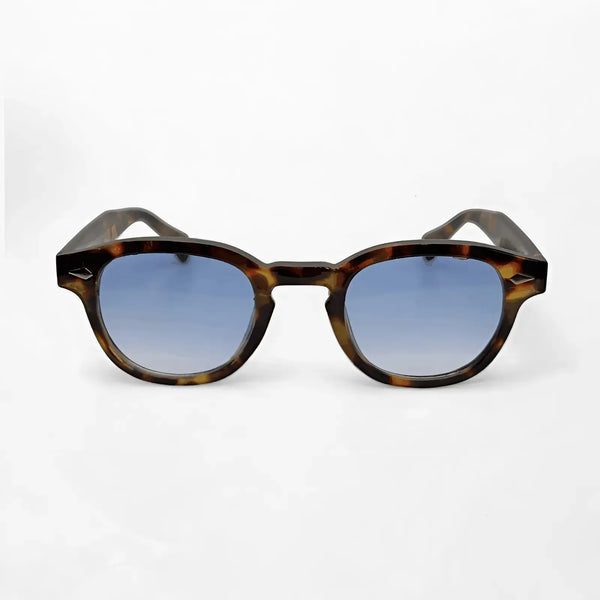 Aqua Tortoise sunglasses featuring a natural tortoise frame and gradient blue lenses, perfect blend of retro and contemporary style.