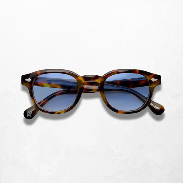 Aqua Tortoise sunglasses featuring gradient blue lenses and natural tortoise frame, perfect for retro and contemporary style.