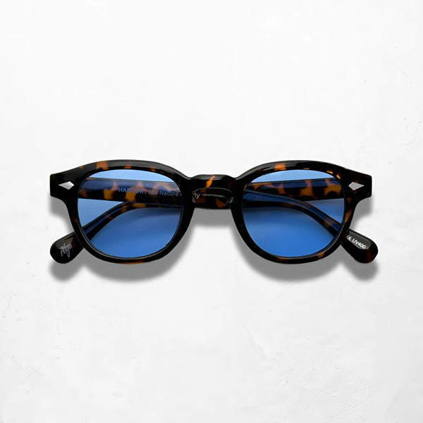 Deep Tortoise sunglasses with gradient blue lenses, featuring a stylish dark tortoise frame and glossy finish.