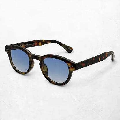 Aqua Tortoise sunglasses with gradient blue lenses, natural tortoise frame, and 100% UV protection.