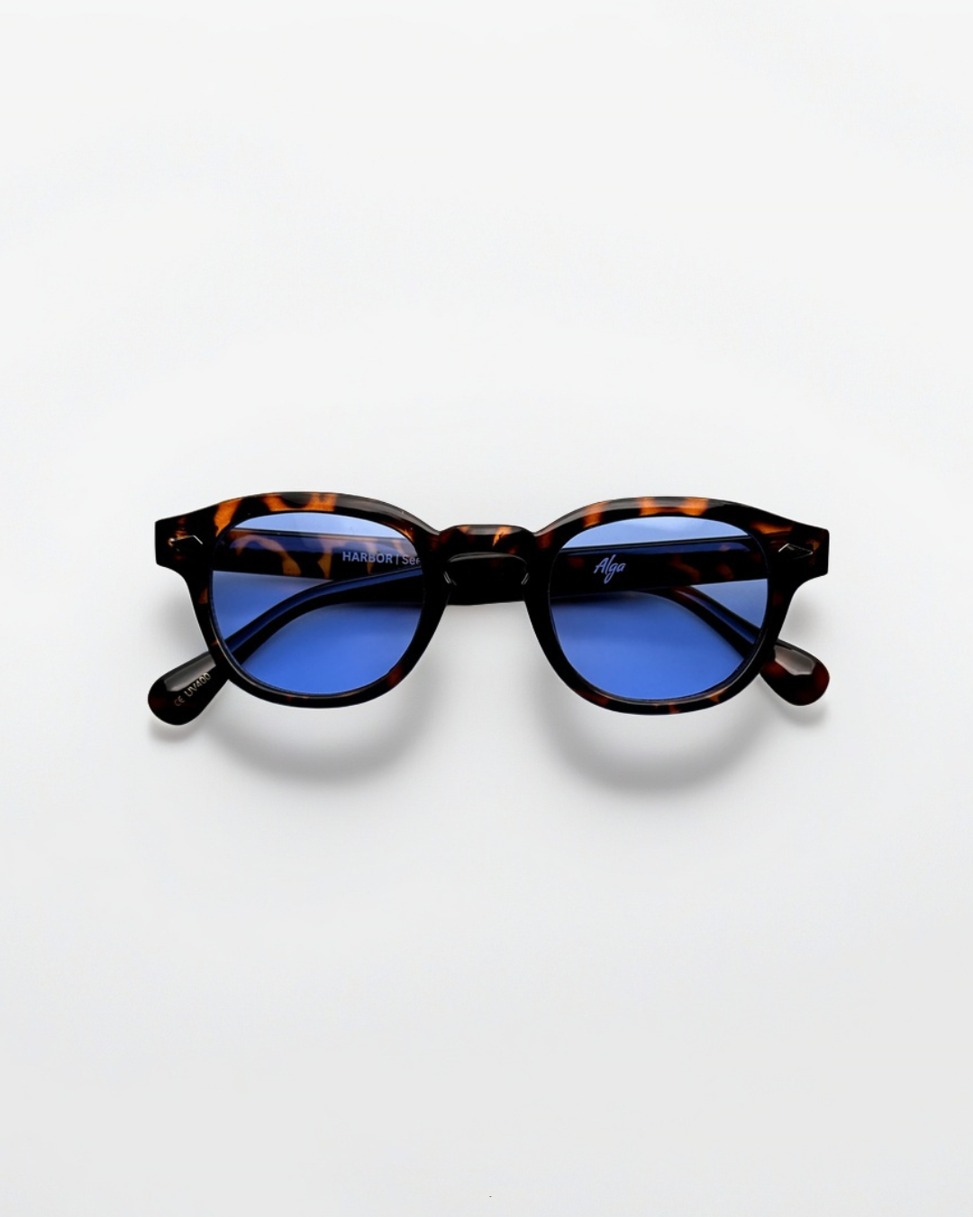 Angled product view of harbor tortoise blue sunglasses by Alga.